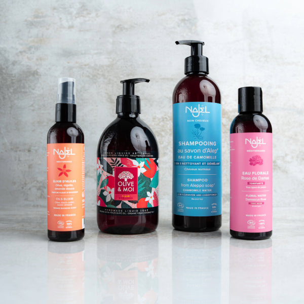 Natural hair care with Aleppo soap bar and conditioner showing healthy, shiny hair results